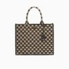 Symbole embroidered fabric handbag