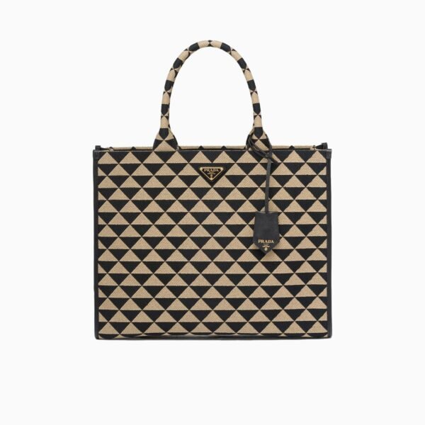 Symbole embroidered fabric handbag