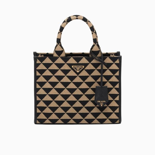 Symbole embroidered fabric handbag
