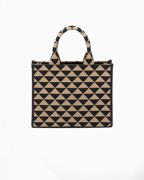 Symbole embroidered fabric handbag