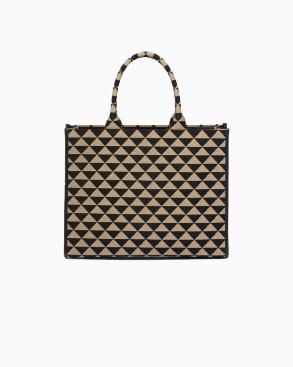 Symbole embroidered fabric handbag