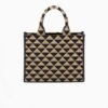 Symbole embroidered fabric handbag