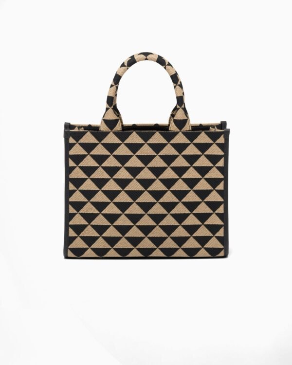 Symbole embroidered fabric handbag