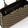 Symbole embroidered fabric handbag