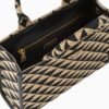 Symbole embroidered fabric handbag