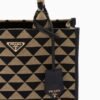 Symbole embroidered fabric handbag