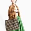 Symbole embroidered fabric handbag